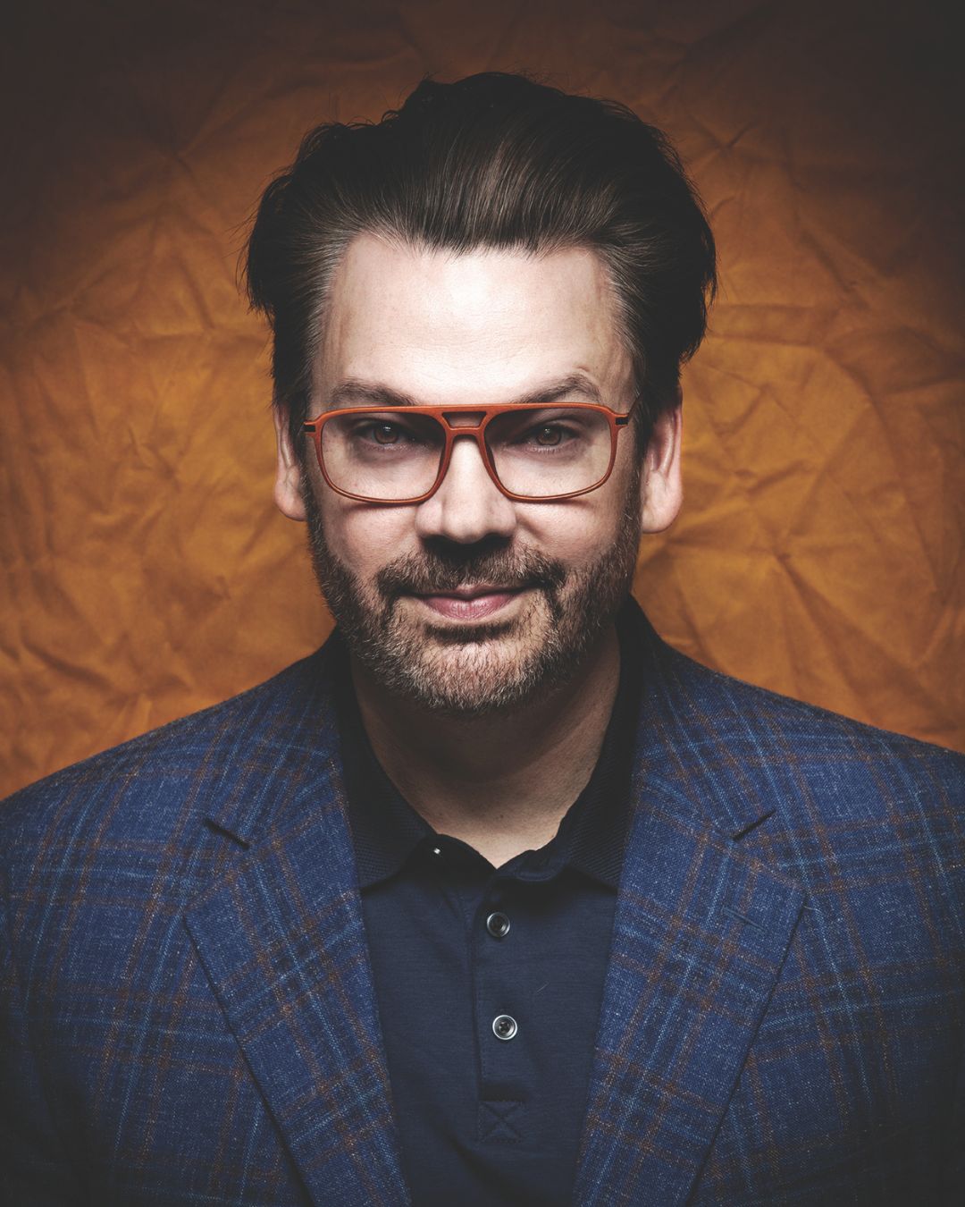 Headshot of Derek Hughes.