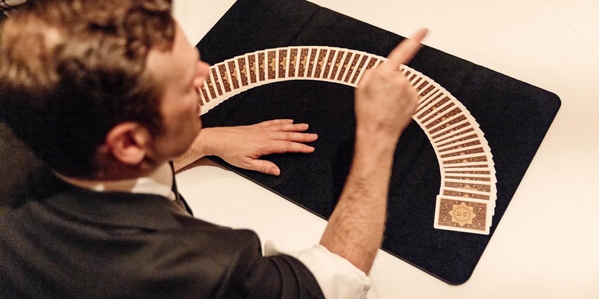 Deck of cards fanned out on a table.